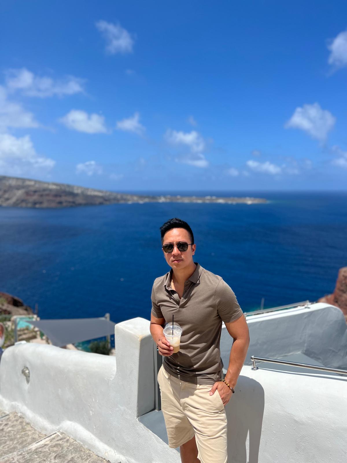 Christian above the caldera in Santorini